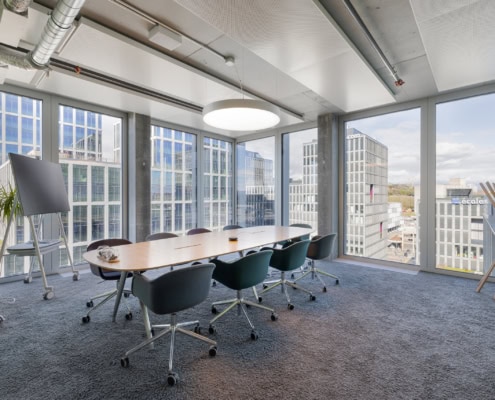 salle de conférence d'une tour avec vue donnant sur le quartier de la Praille à Genève